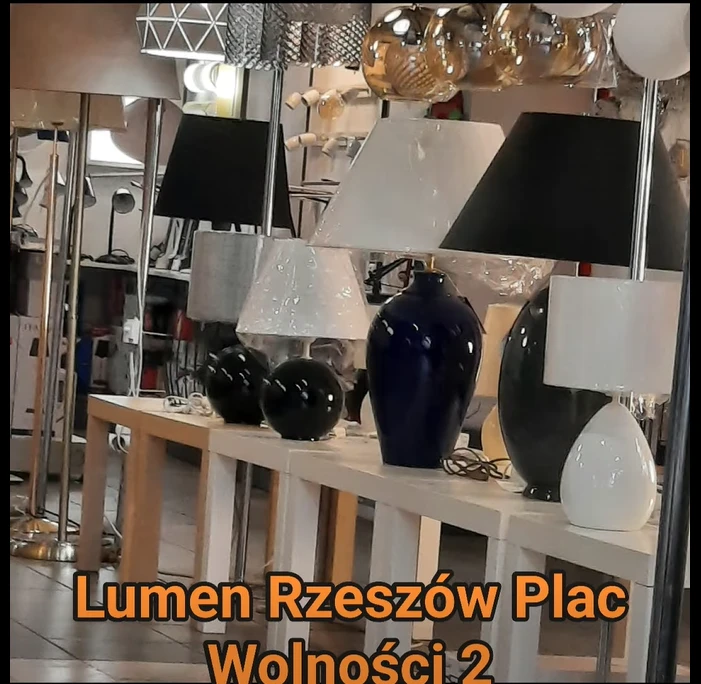 A display of table and floor lamps at the Lumen showroom, Pl. Wolności 2